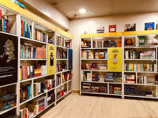 books on brown wooden shelves