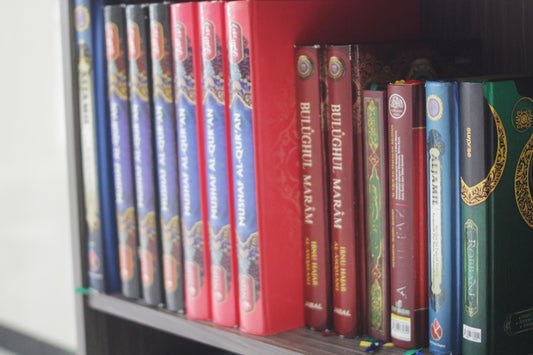 a book shelf filled with lots of books