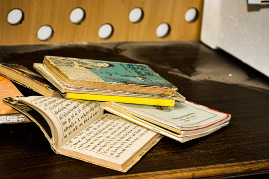 a stack of books on a table