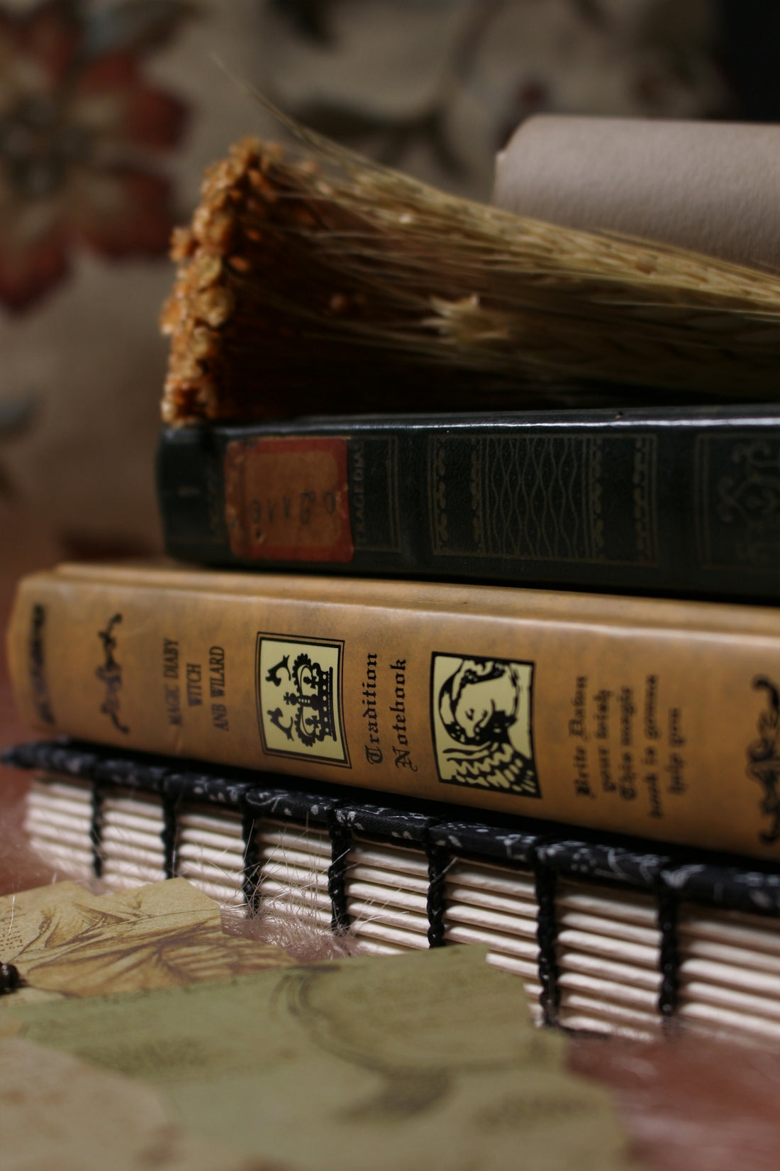 a stack of books sitting on top of a table
