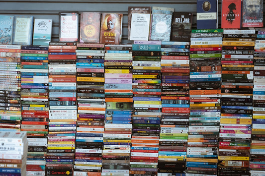 Wall of books with many colorful spines